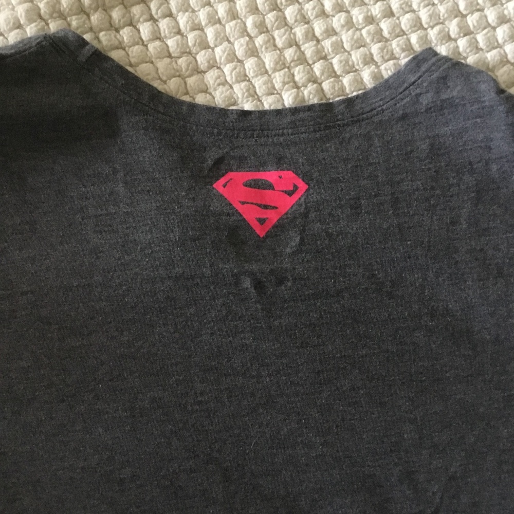 Under Armor T-Shirt “Super Woman”…semi fitted HEAT Gear. New condition .